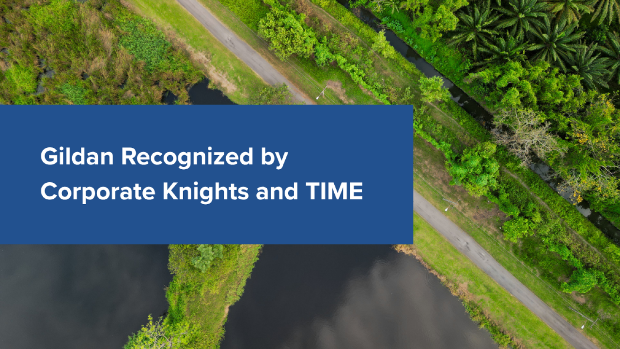 "Gildan Recognized by Corporate Knights and TIME" printed on backdrop of trees and water. 