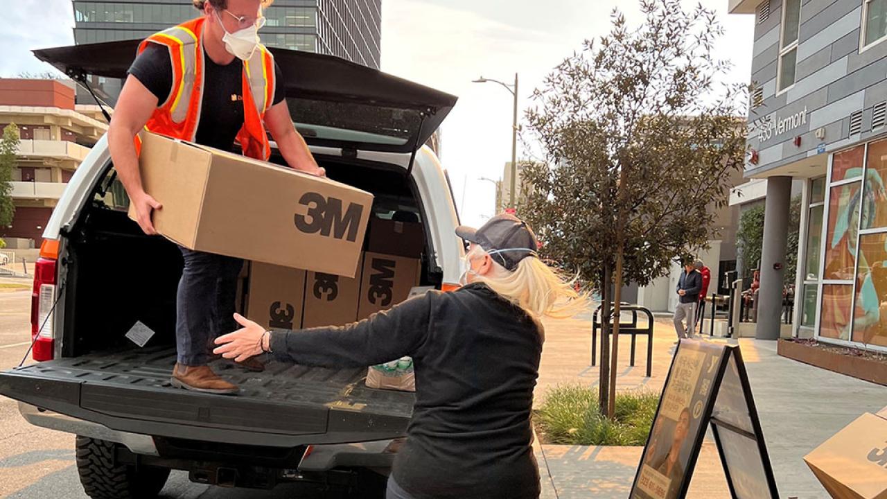 Direct Relief volunteers unloading 3M N95 Respirators in LA.