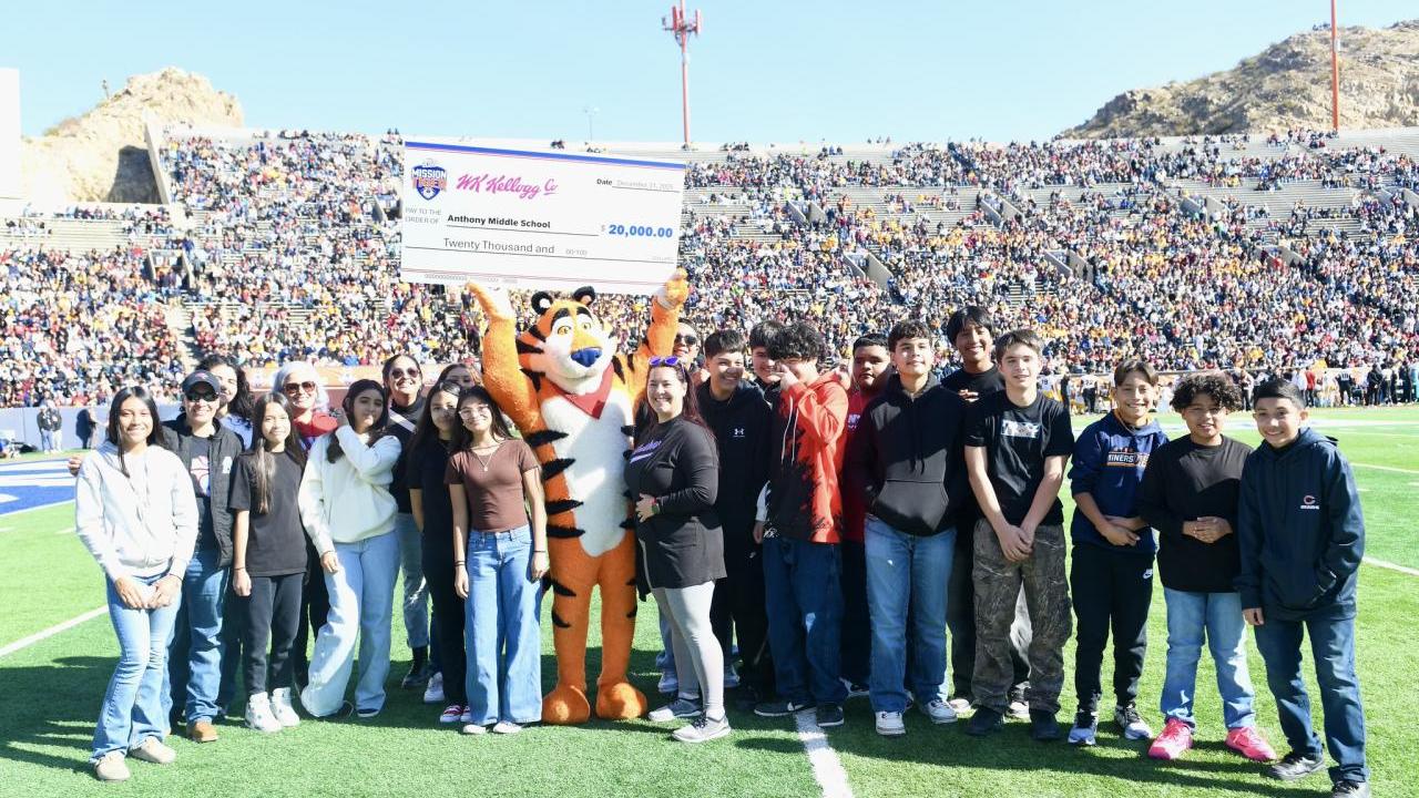 Students celebrate with Tony the Tiger 