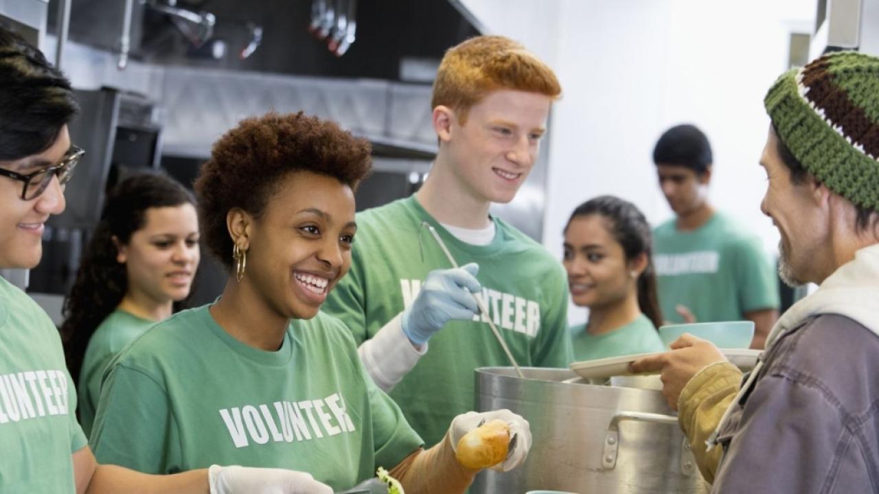 Volunteers serving food