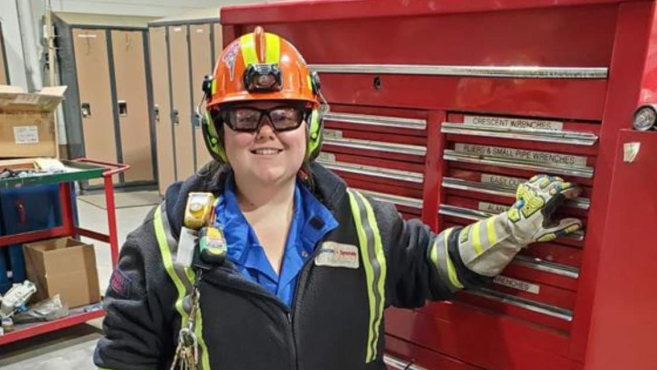 Darvi Higdon in safety gear at a work site