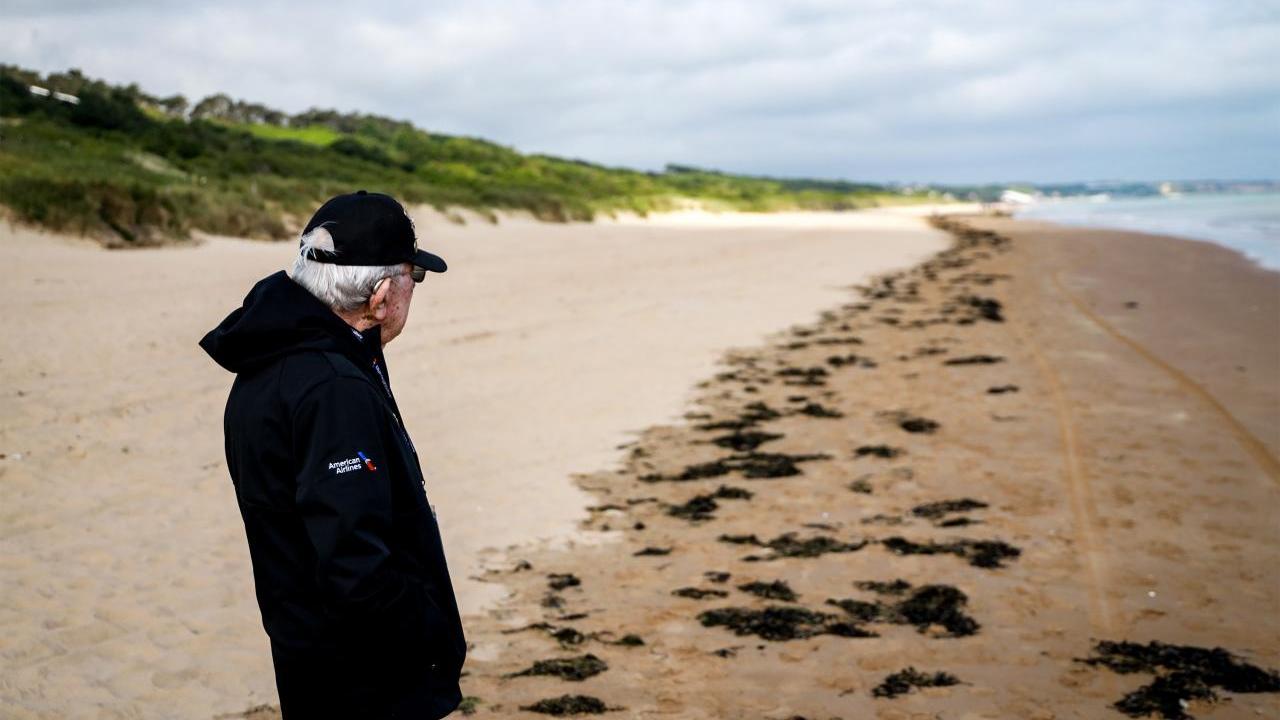 A person stood on the beach