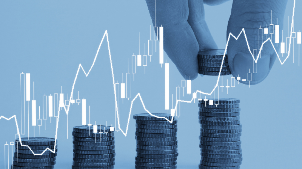 Stacked coins and line of data