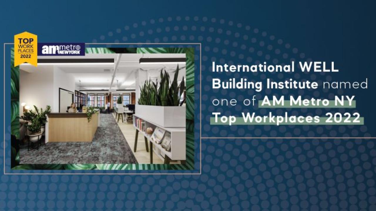 office reception desk and plant lined hallway. On the right a text block "International WELL Building Institute named one of AM Metro NY Top Workplaces 2022