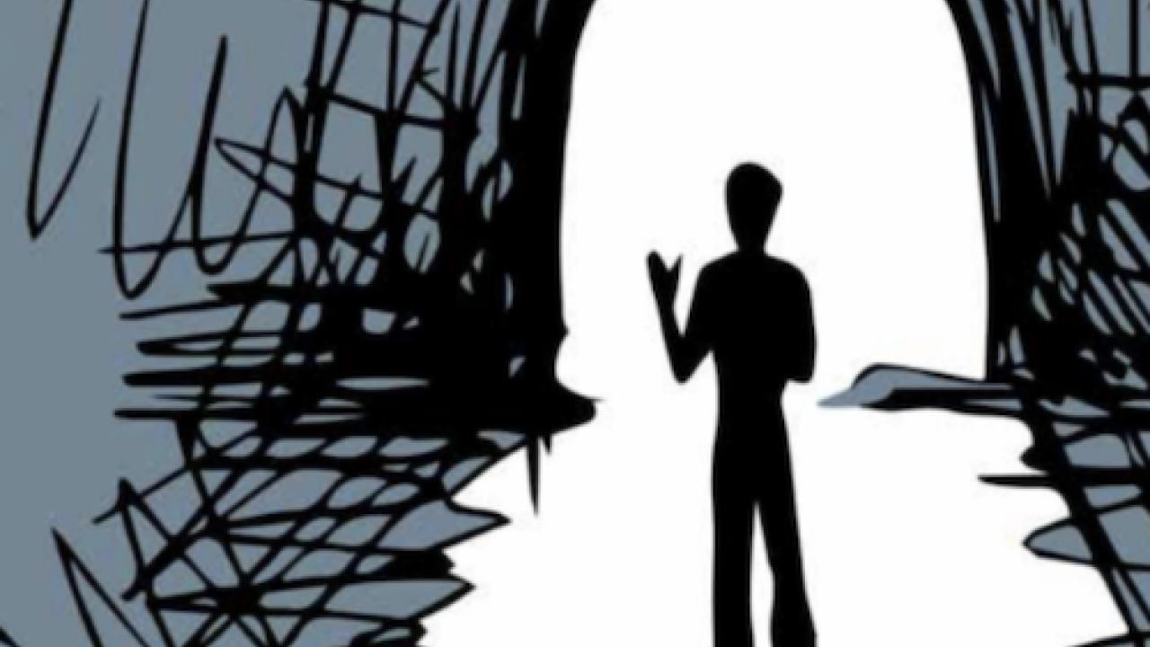 Figure of a person in a tunnel.
