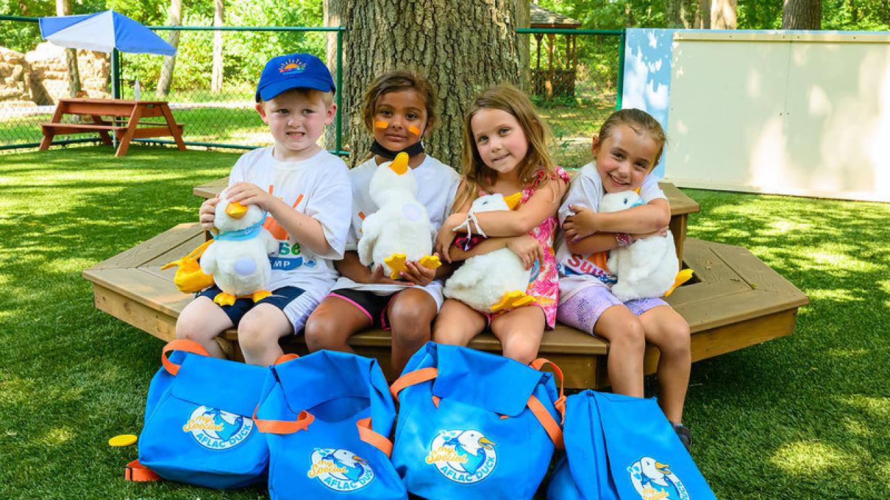Children with Aflac Ducks.