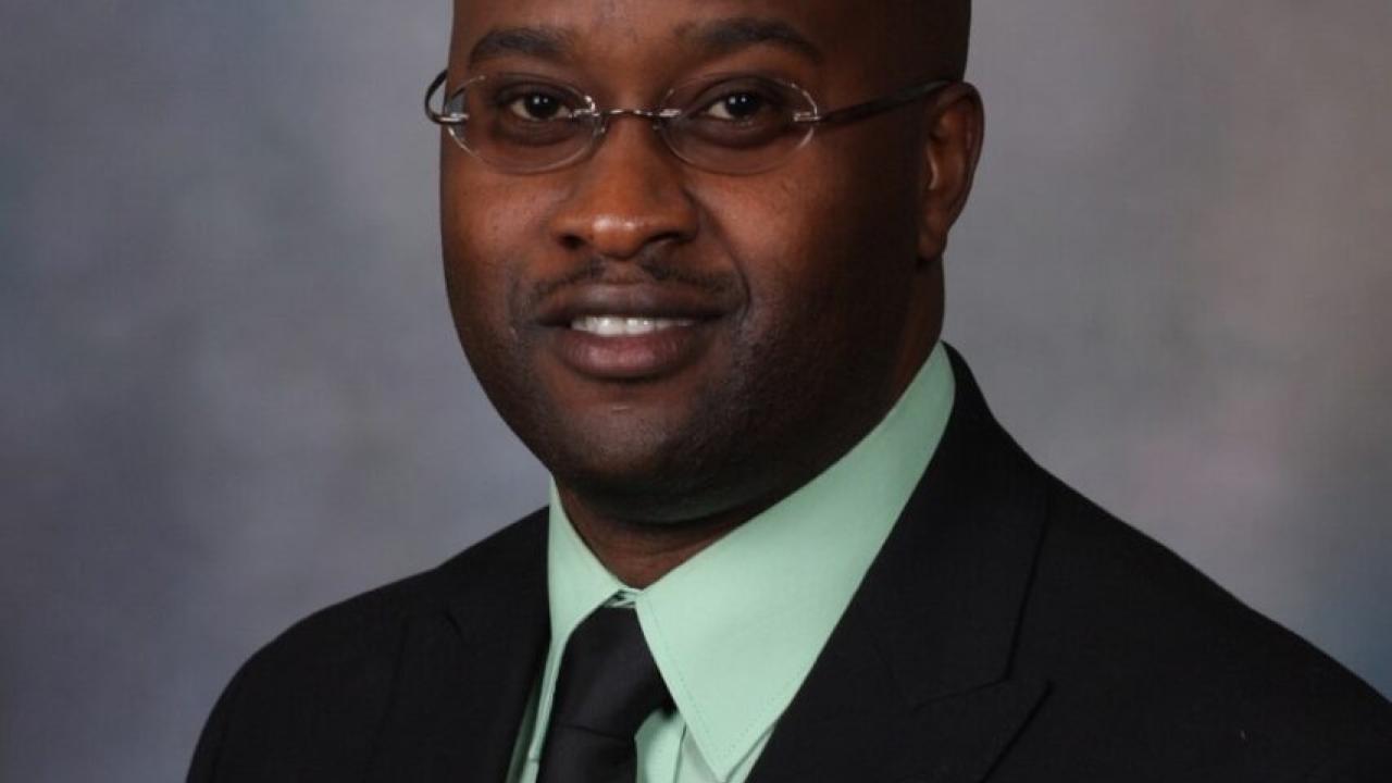 Headshot of Drew Bomett