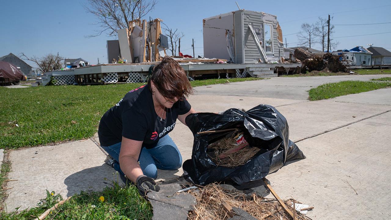 volunteer picking up trash