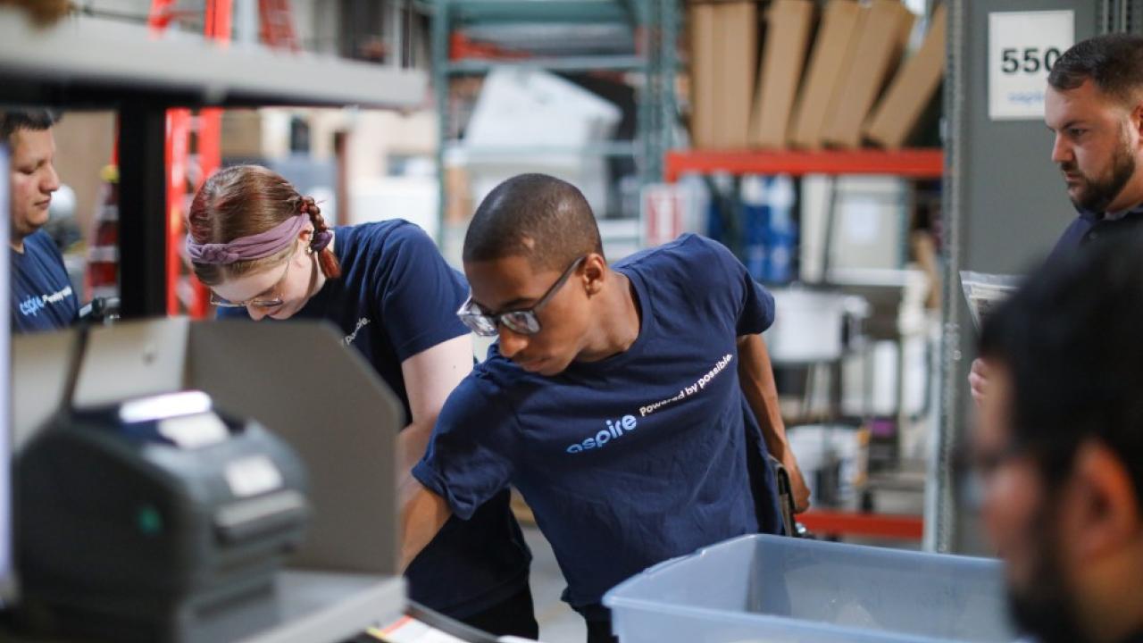 Aspire trainees get hands-on experience in a simulated warehouse environment
