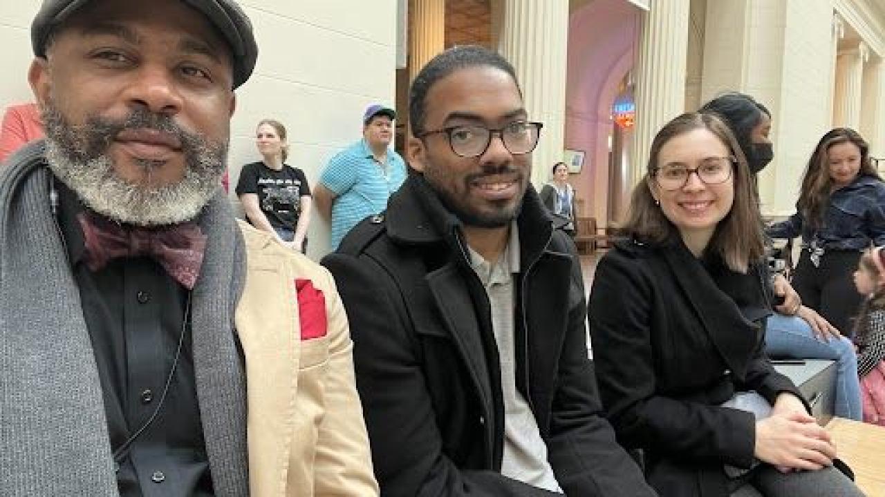 3 people smile 