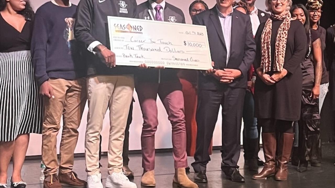 Grand Prize winner of $10,000 at the Bank Tank competition.