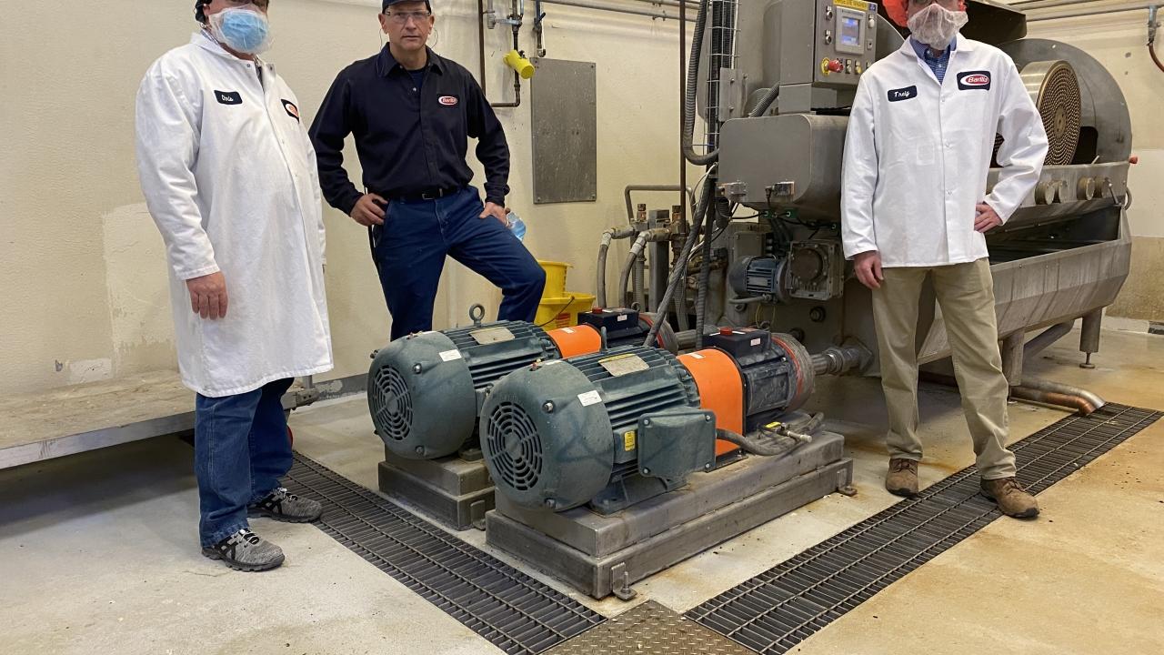 Barilla Plant Director Chris Buseman, Plant Mgr Bill Boula, National Grid Energy Efficiency Specialist Jay Snyder with die wash pump