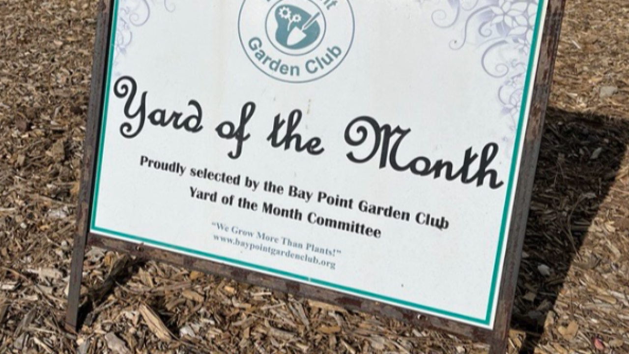 lawn sign reading Yard of the Month