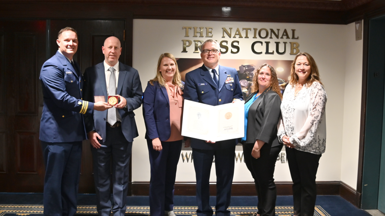 Marathon Petroleum employees receiving award from U.S. Coast Guard