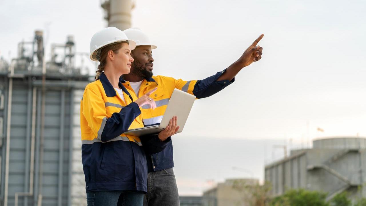 Engineers looking onward at site 