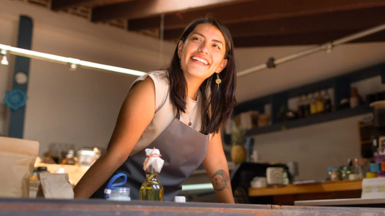 A woman in an apron.