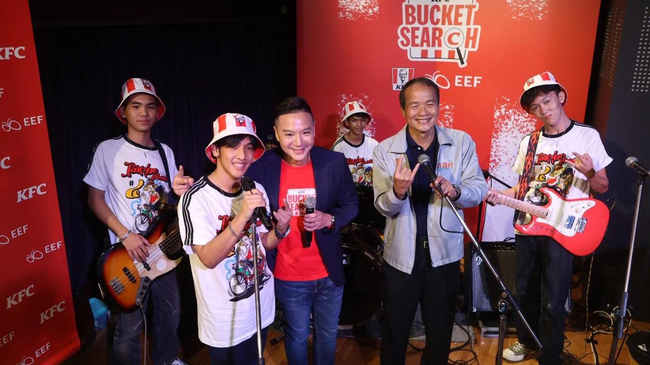 band posing together with instruments
