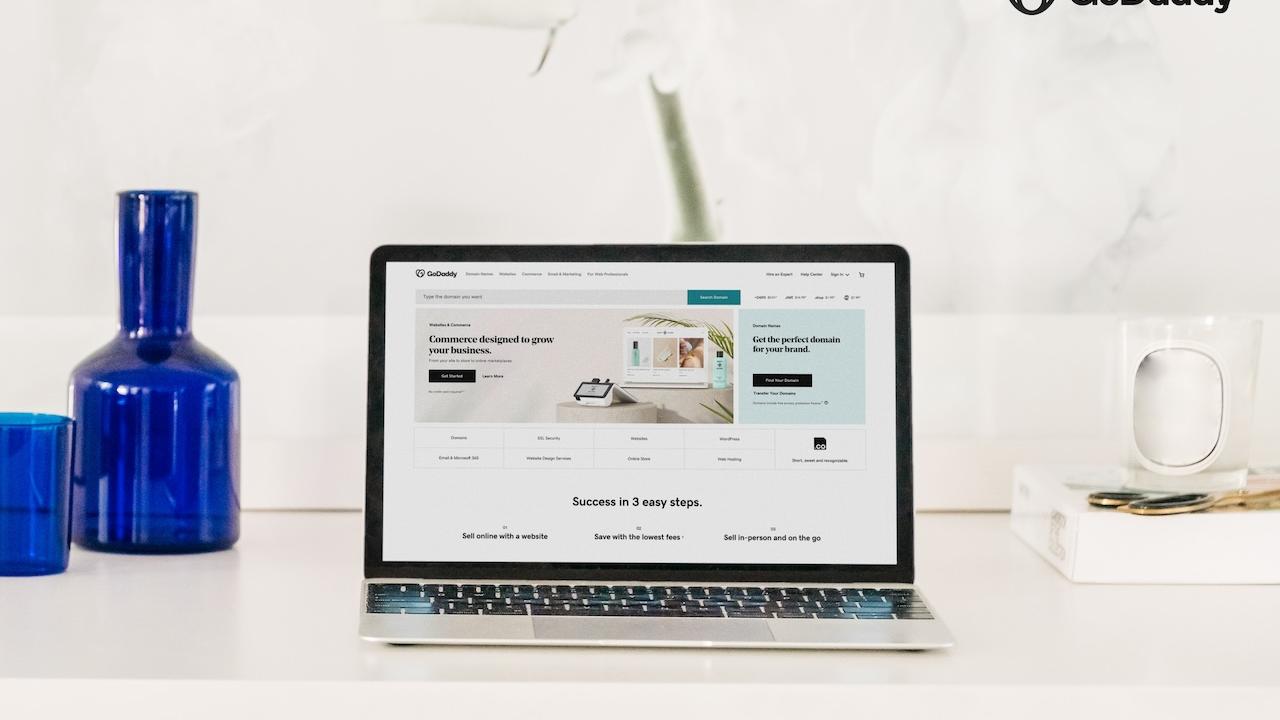 Laptop shown on a white desk with a white background.