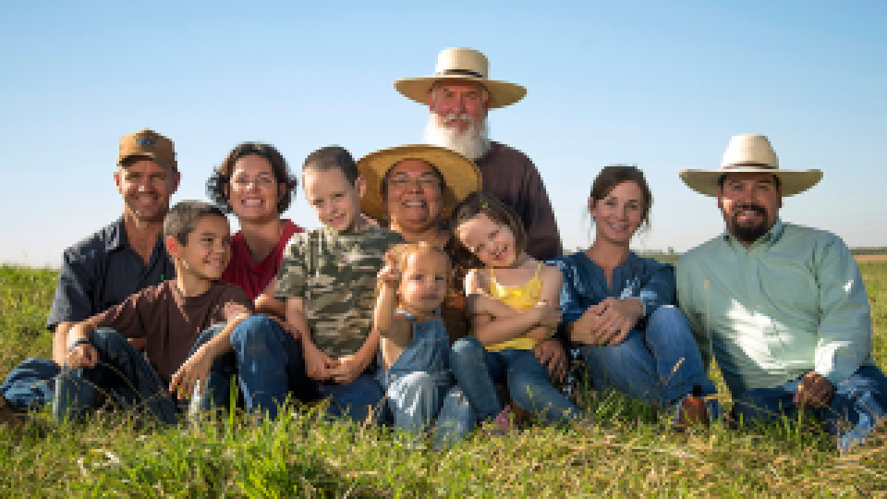 Group of farmers shown.