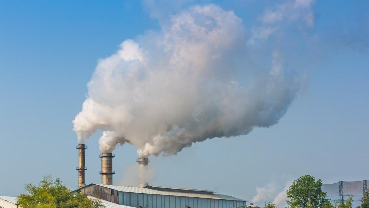 Clouds of gas emerging from smokestacks