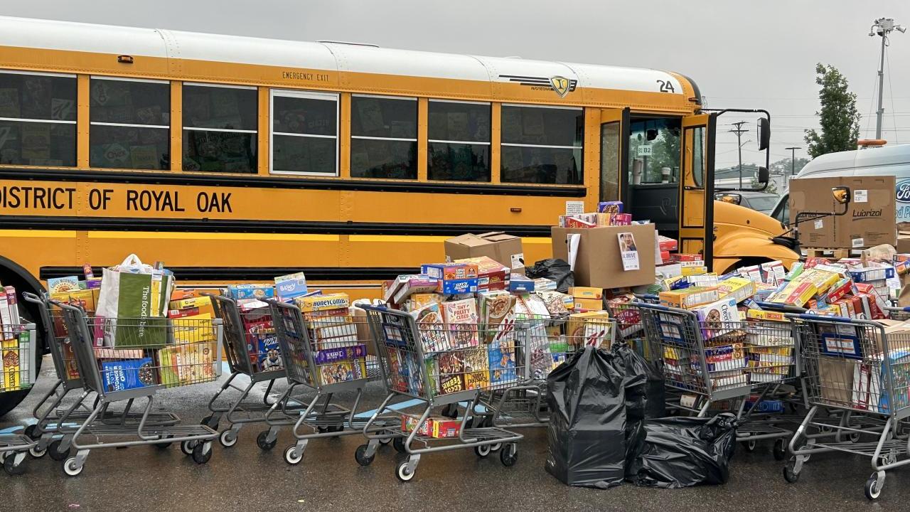 Boxes of donated cereal outside of the school bus