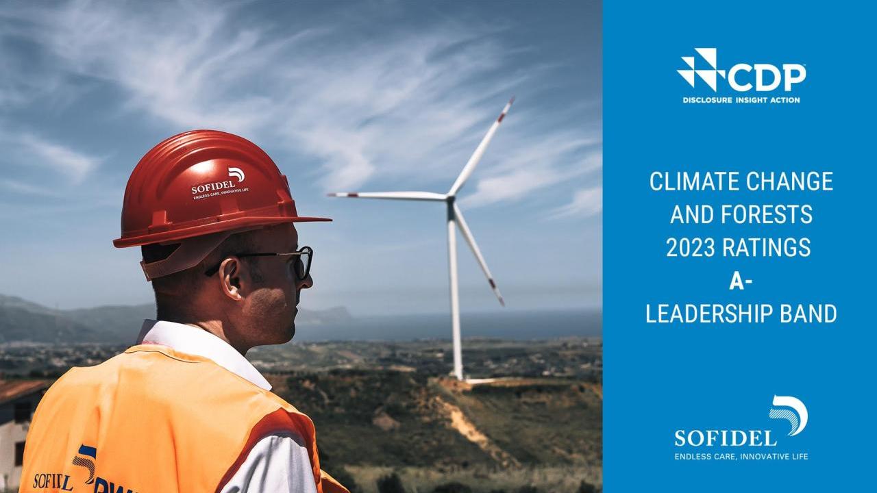 CDP logo with "Climate Change and Forests 2024 Ratings, A- Leadership Band" with image of person in front of windmill
