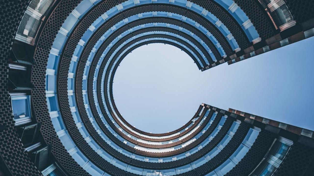 artistic circular building with a view of the sky