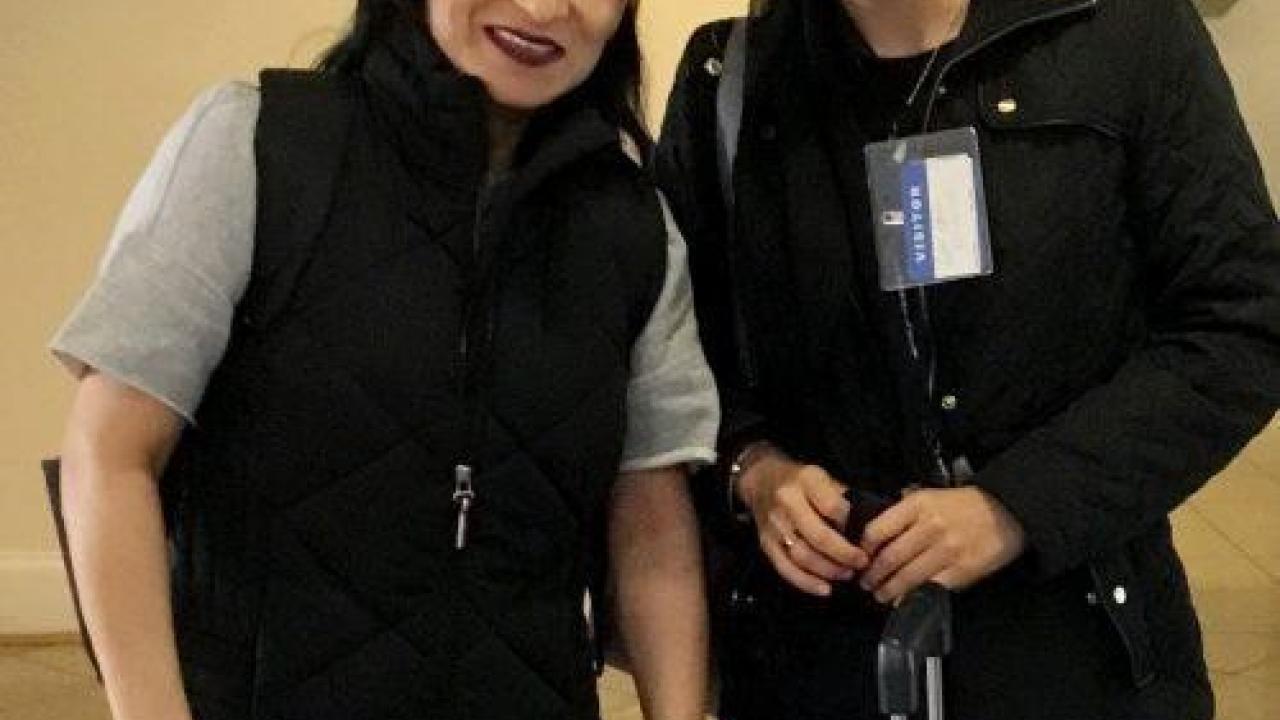 two people smiling for the camera together