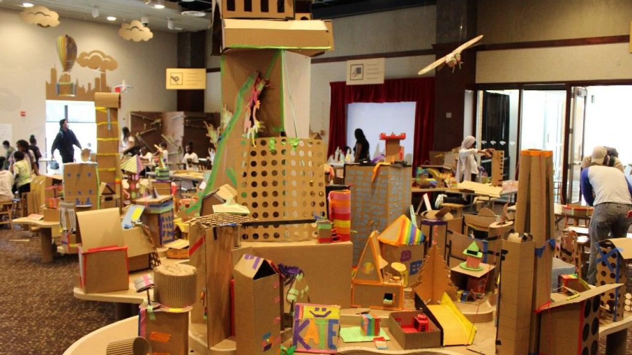 Small buildings made out of cardboard 