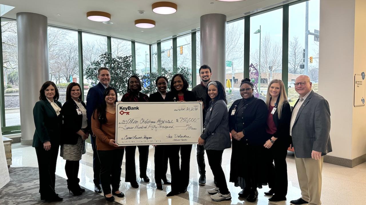 Representatives from Akron Children's Foundation shown receiving a $750,000 grant from KeyBank.