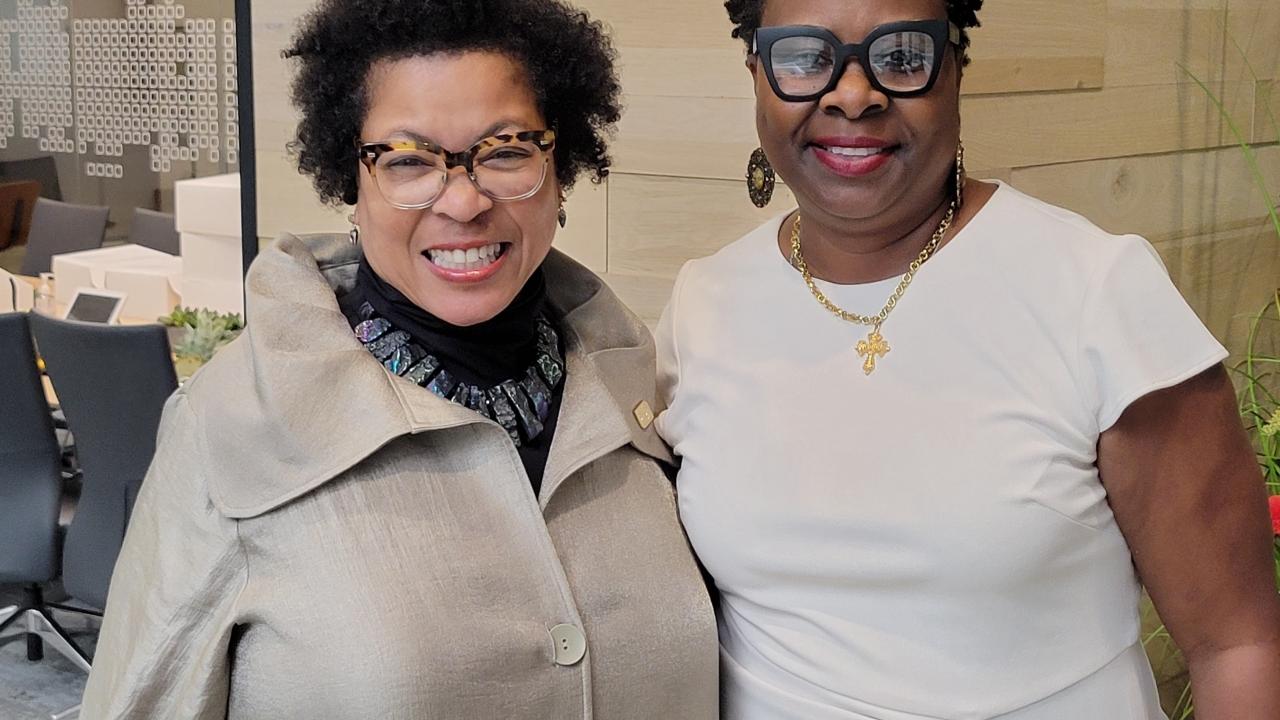 Stephanie Smith and Carla Cobb in an office setting