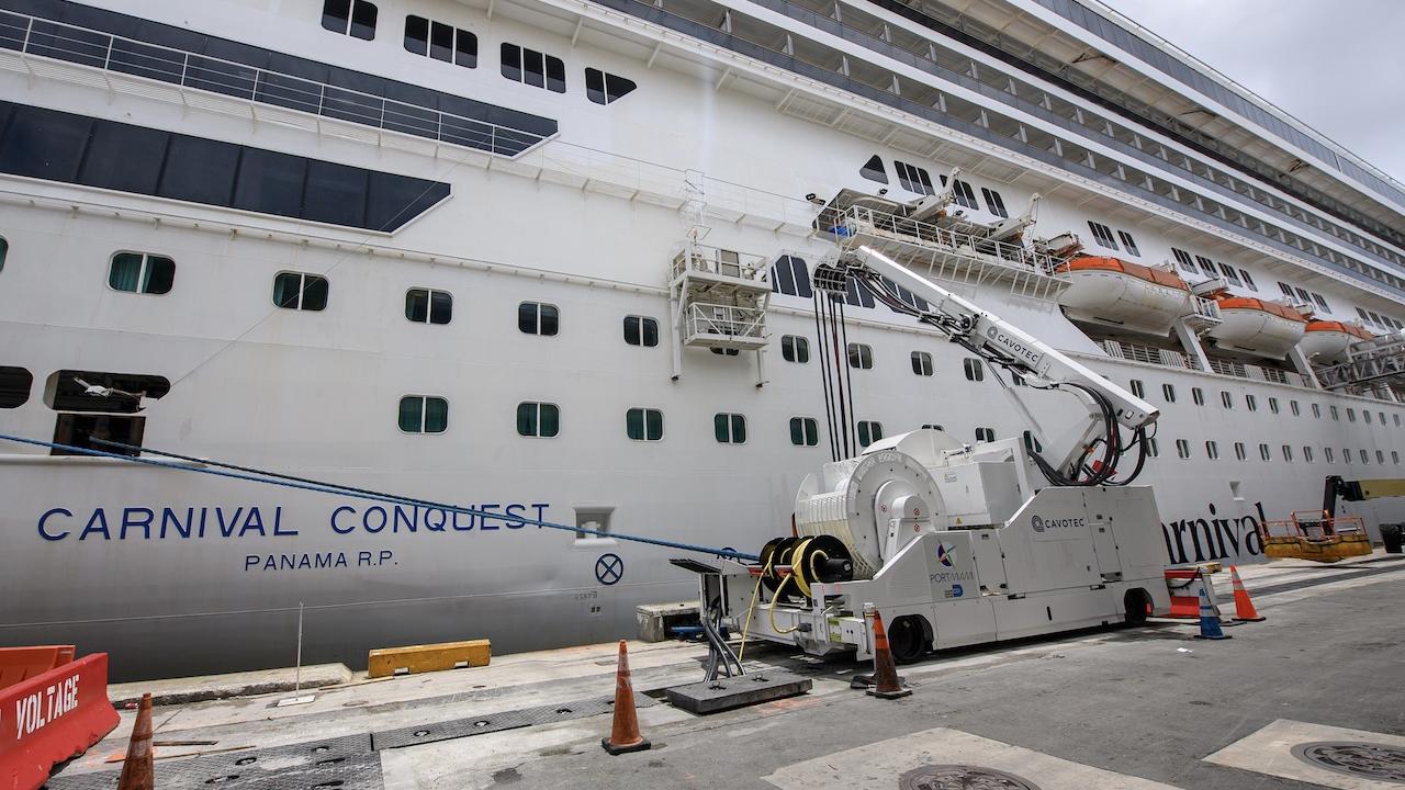 Carnival Corporation celebrates the launch of shore power at PortMiami during an inaugural event where it was announced that Carnival Conquest will lead the charge as the first cruise ship to plug into landside electrical power at the cruise capital of the world. Credit: Miami-Dade County