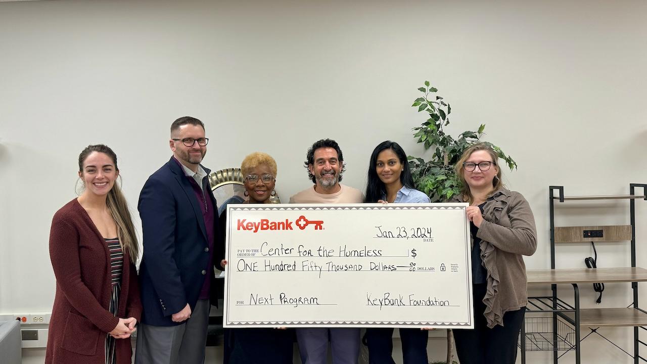 The Center for Homeless in South Bend team shown with a $150,000 grant check.