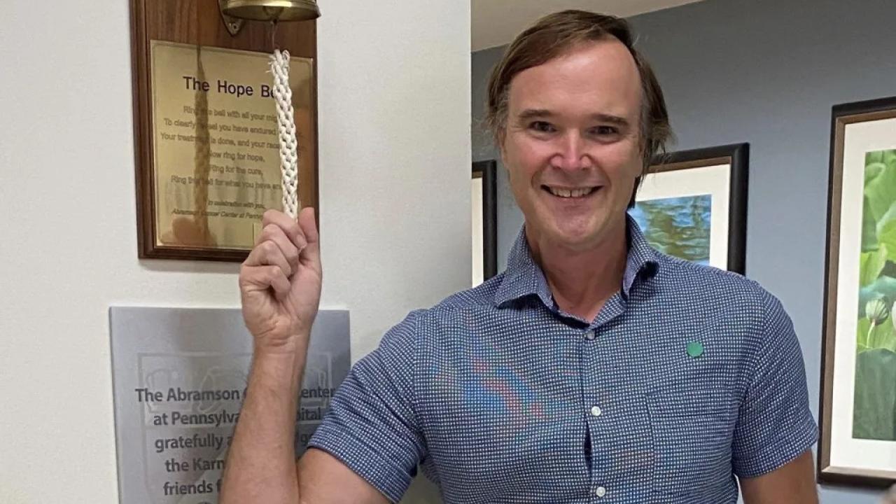 Chet Kitchen ringing a 'hope bell'.