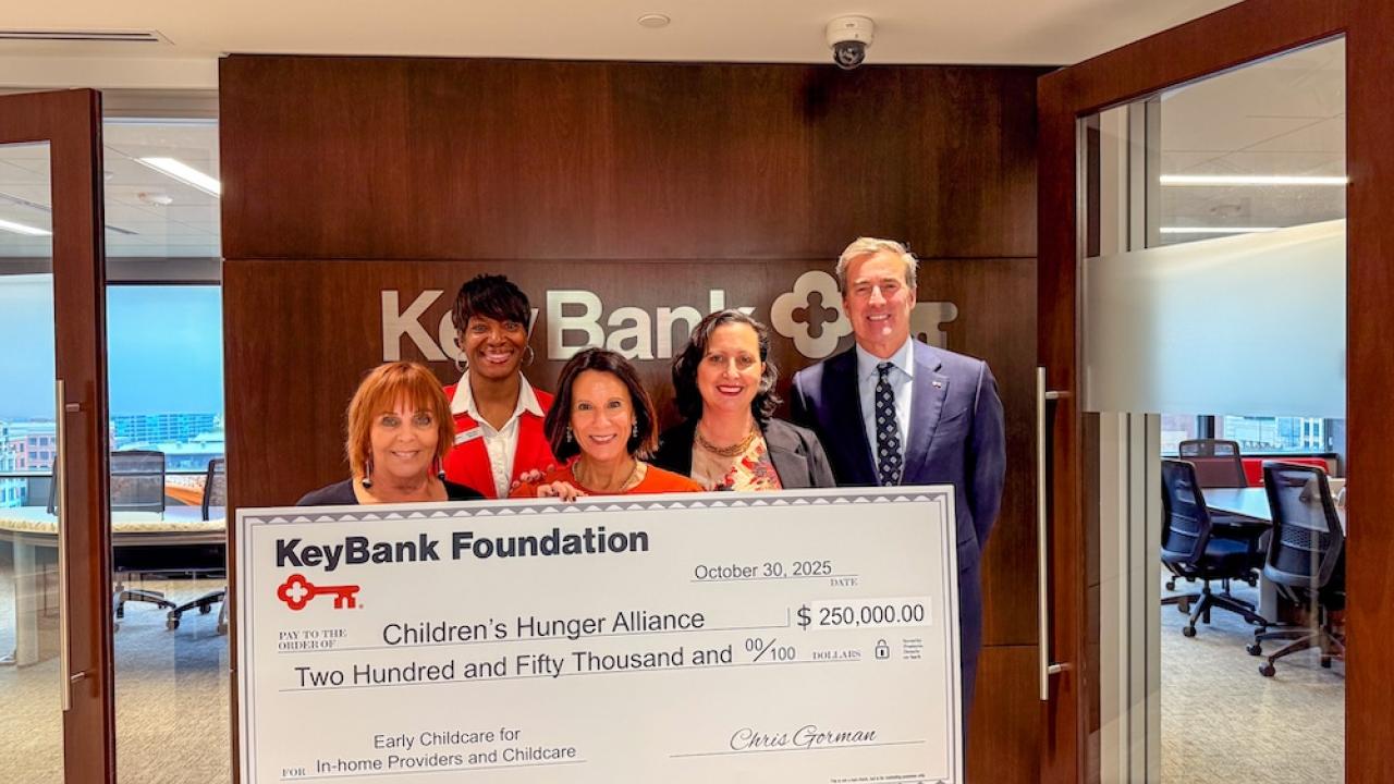 Members of the Children's Hunger Alliance and KeyBank representatives shown with a $250,000 grant check.