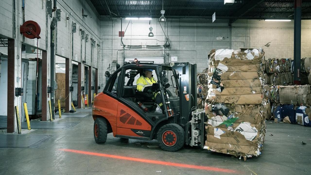 Recycling being loaded on forklift