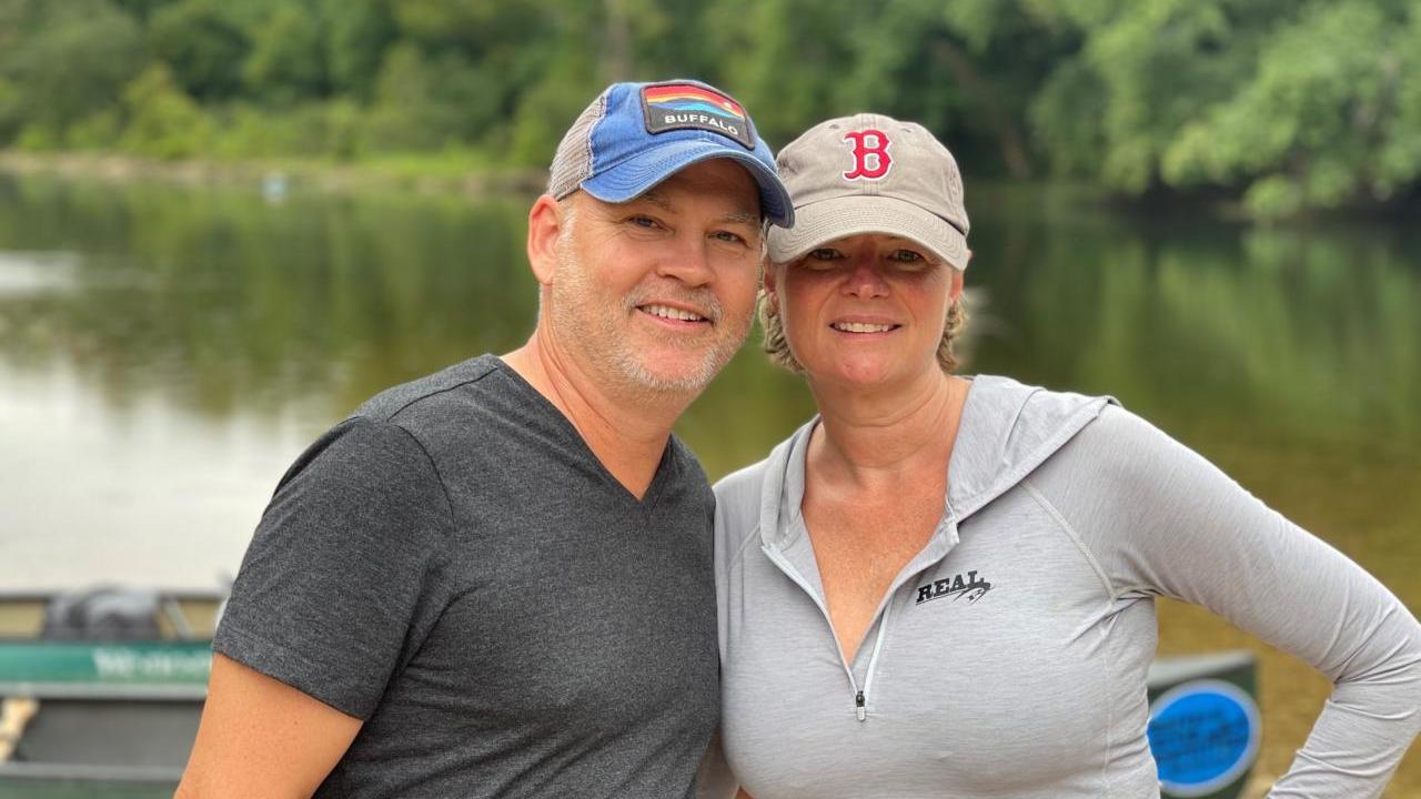 Clarise Ashworth and another posed with a body of water behind them.