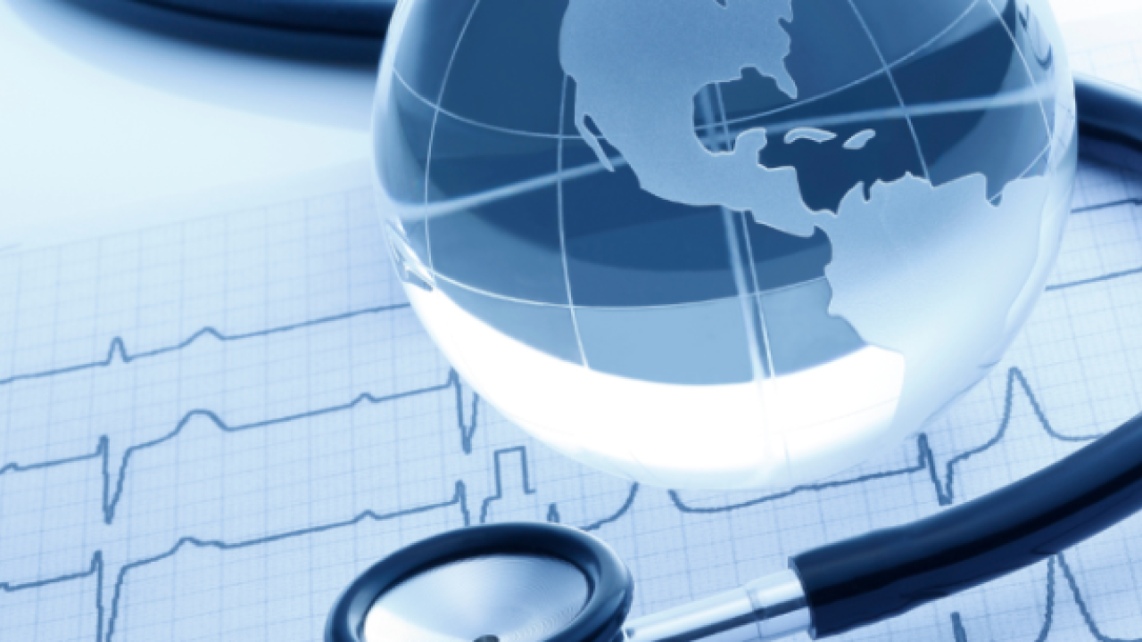 Medical equipment surrounds a representation of a globe