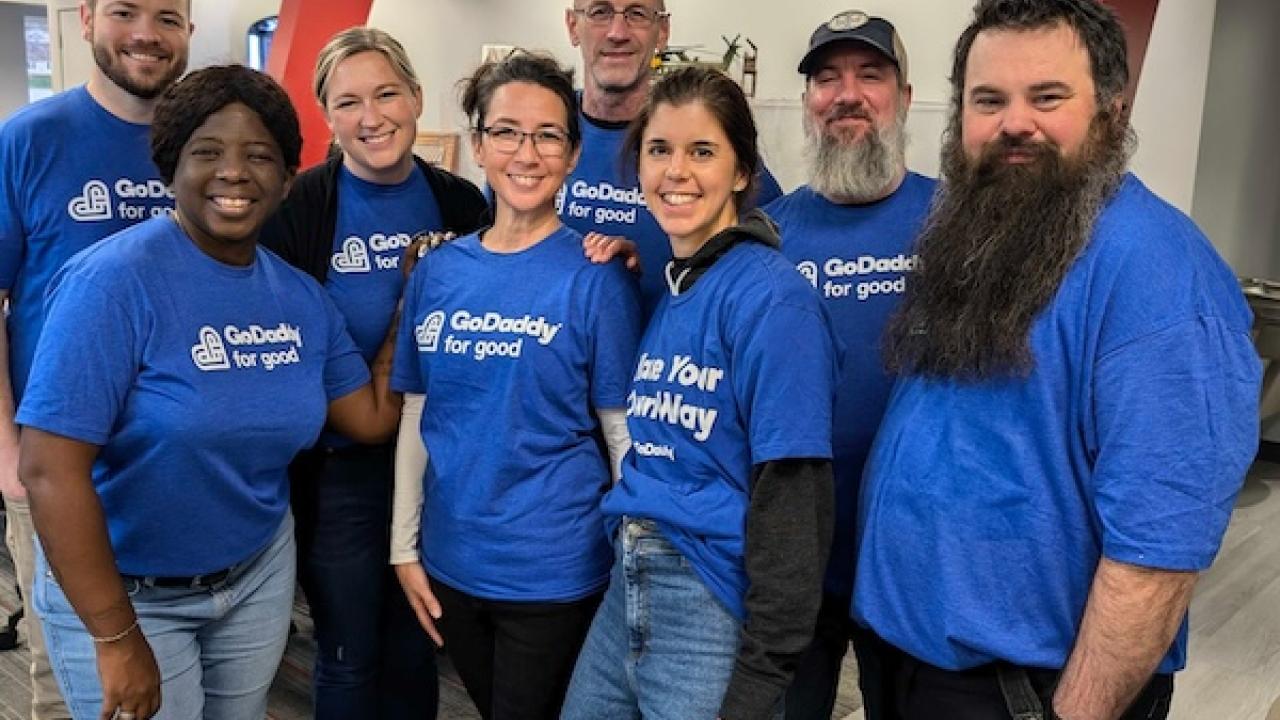 Group photo of GoDaddy team members.