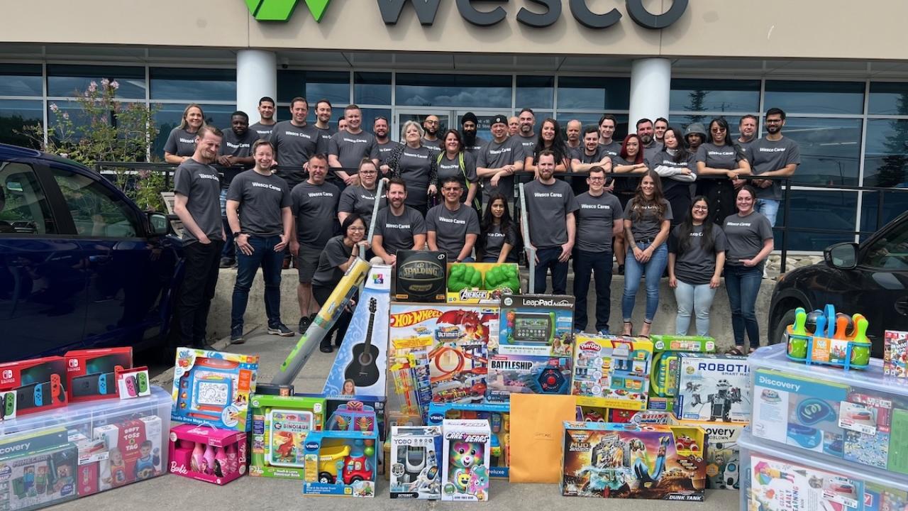 Wesco Team shown with their donations.