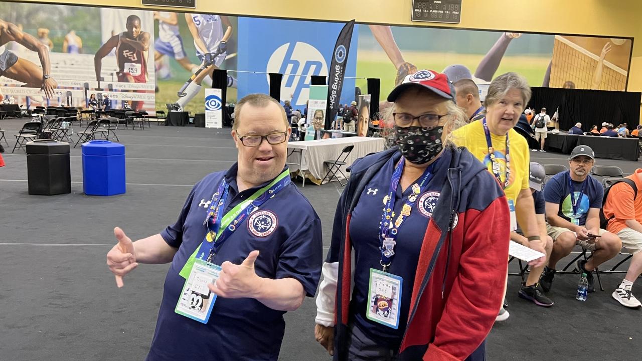 Two Special Olympics participants wearing glasses 