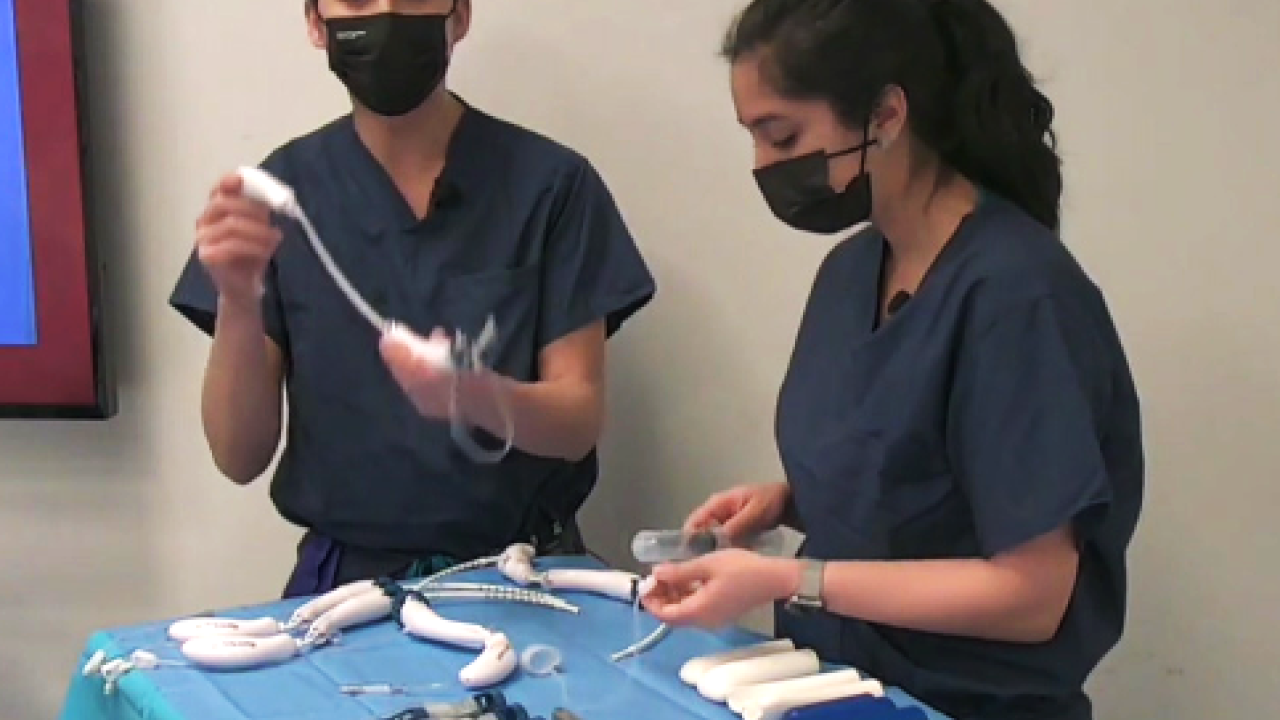 surgeons with medical devices