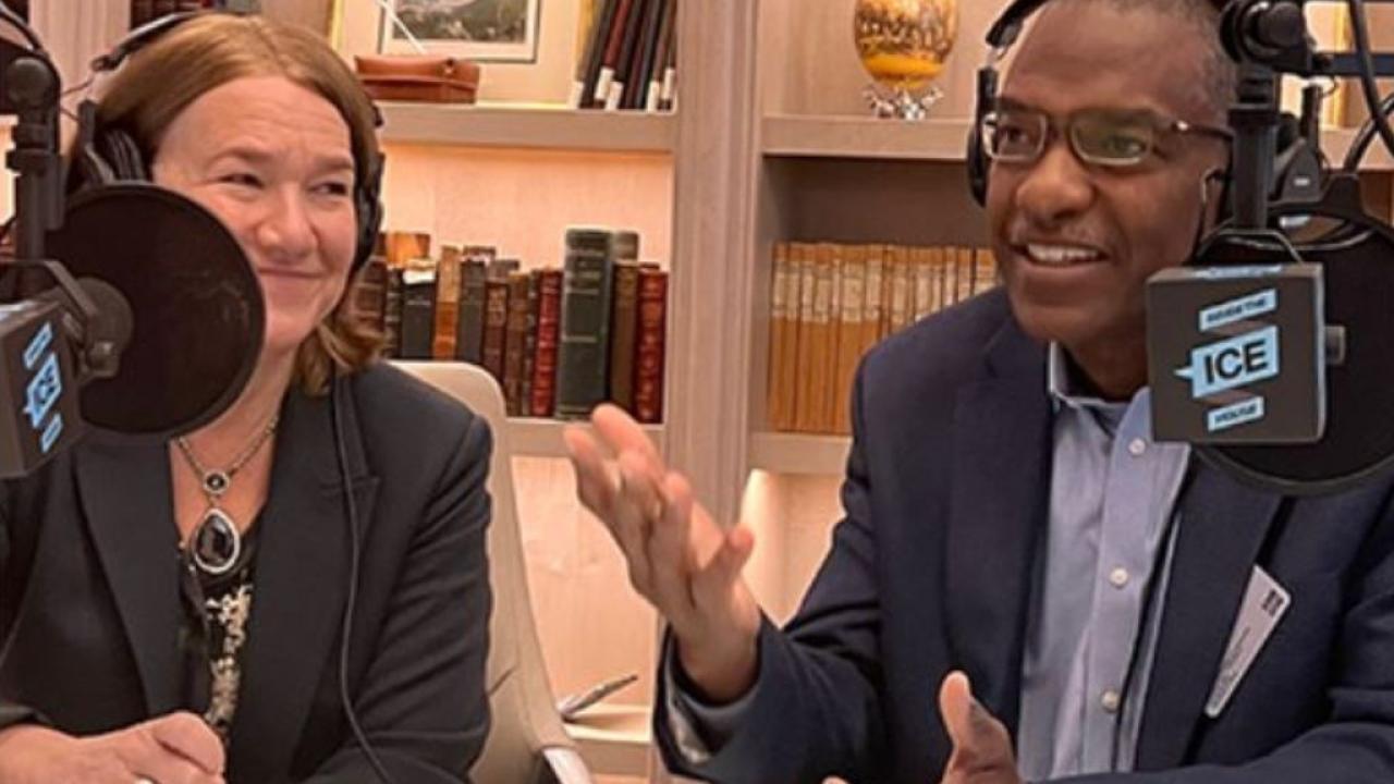 Alison Lewis and Robert Long record a podcast 