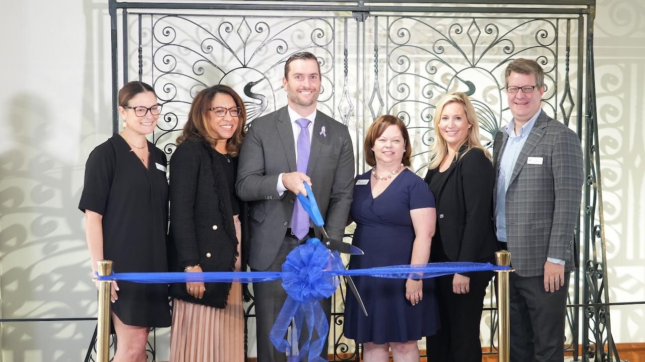 Cutting the ribbon at the South Carolina State Museum. 