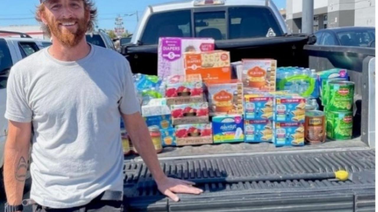 Mike Ash with a truck full of food to donate to shelters in Detroit.