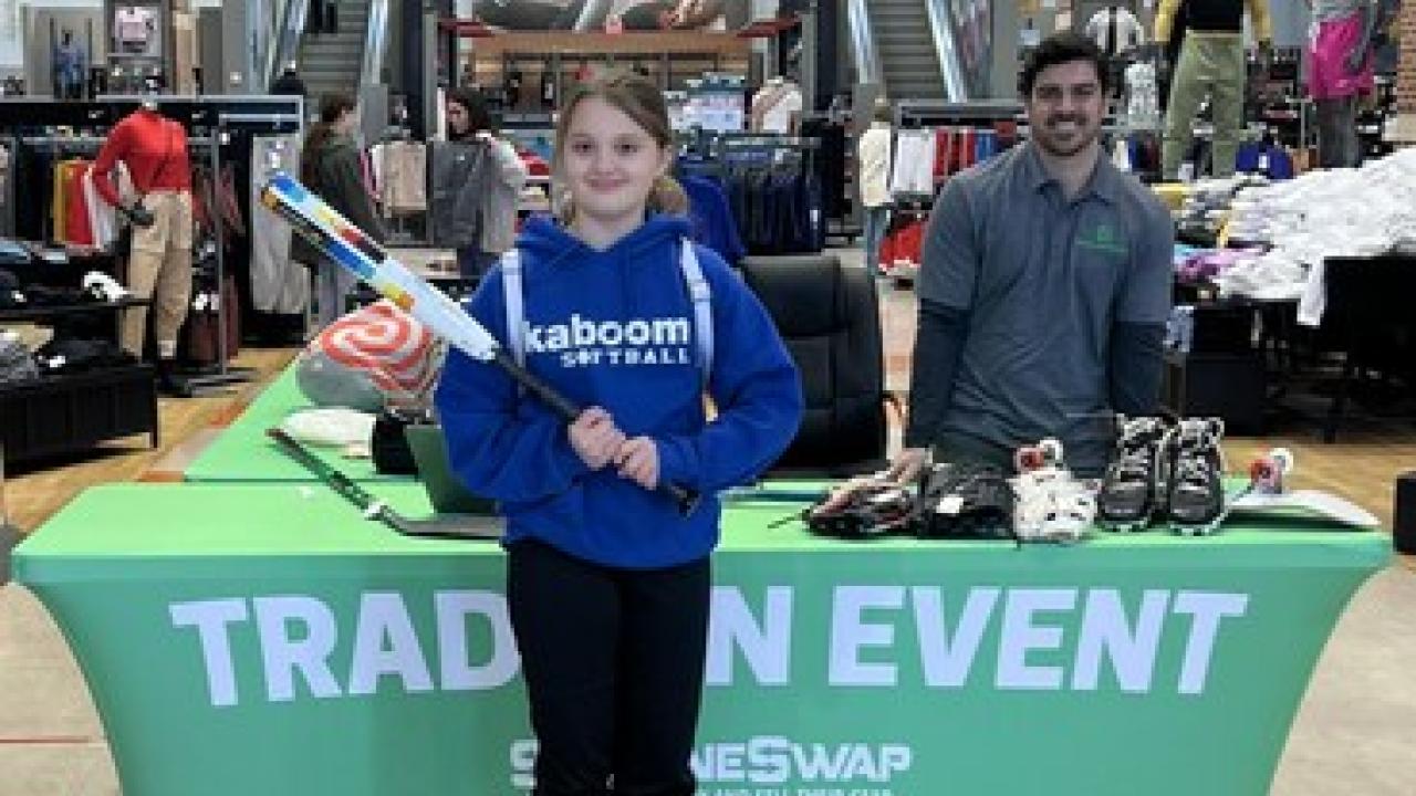 Young girl at the DICK'S Sporting Goods Sideline Swap trade in event.