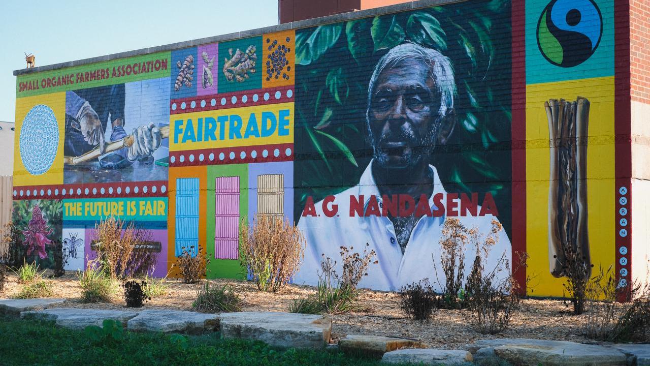 Mural depicting spice farmer, A.G. Nandasena in Coralville, IA, commissioned by Fairtrade America.