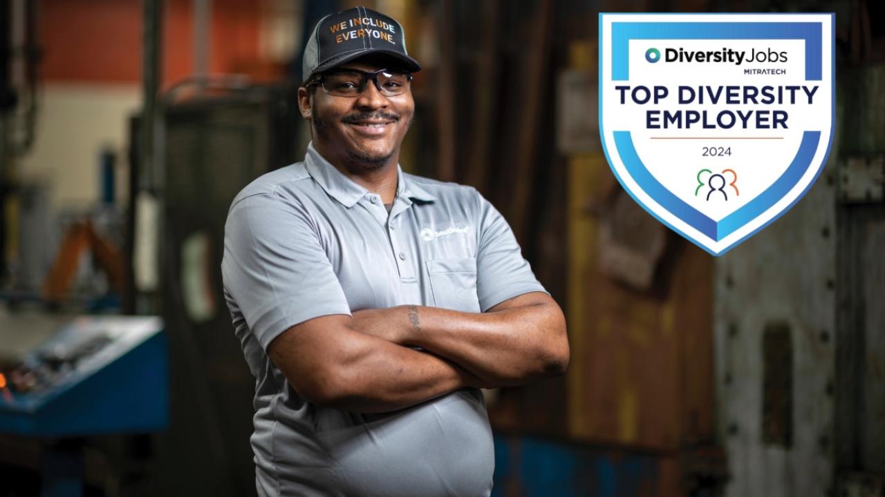 A smiling person with arms crossed "Top Diversity Employer" badge to the right.