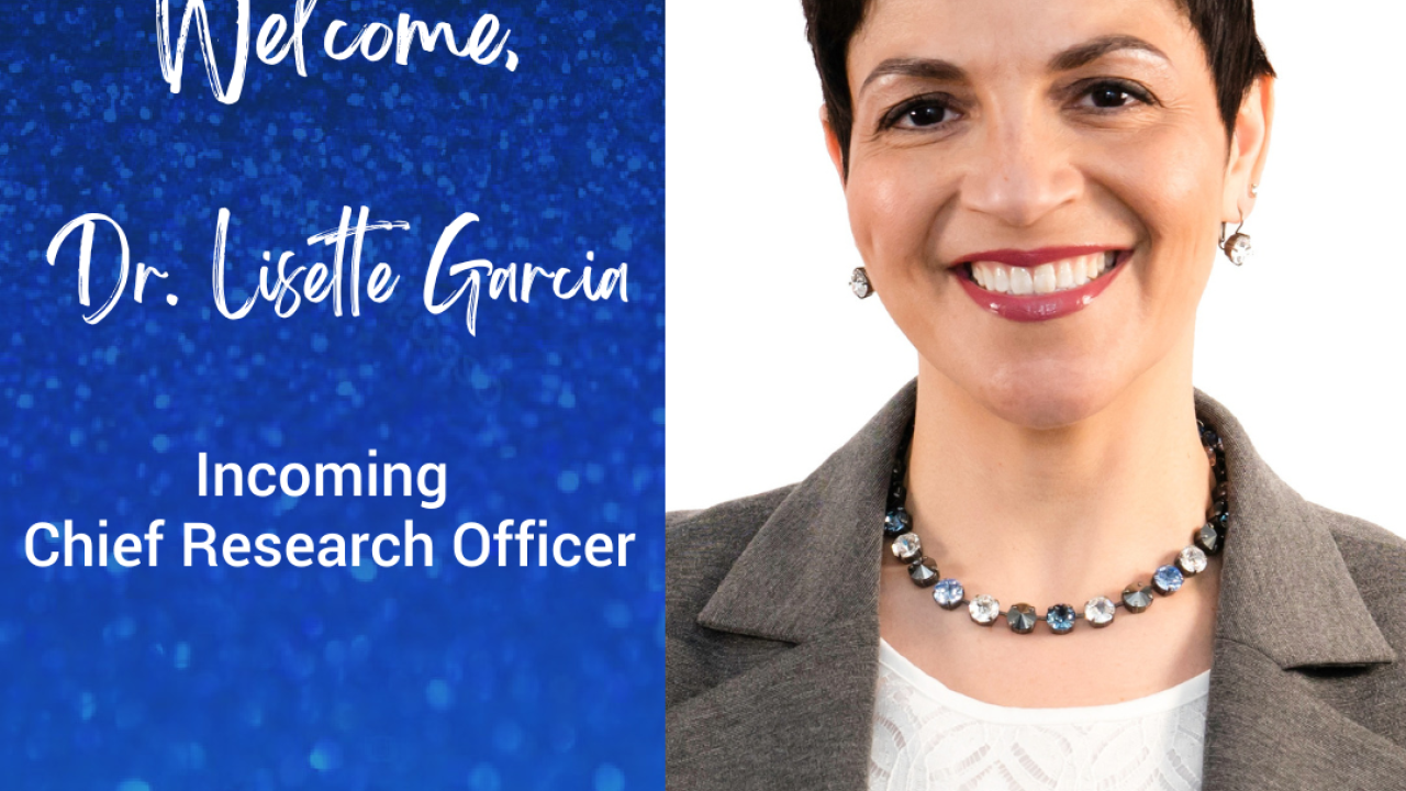 Photograph of Lisette M. Garcia on right, blue background on left with Hispanic Association on Corporate Responsibility logo up top and the words, "Welcome Dr. Lisette Garcia" and "Incoming Chief Research Officer" and "hacr.org" and "#HACRresearch"