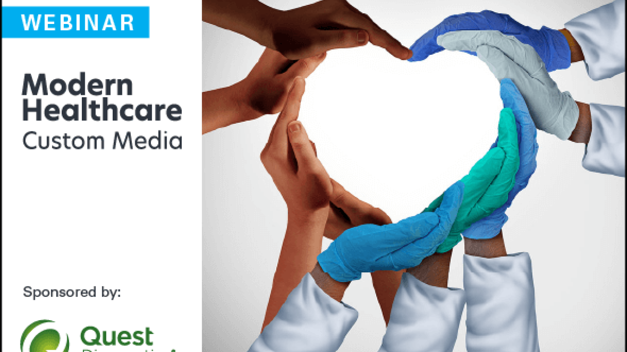 A bunch of hands curved together to form a heart.
